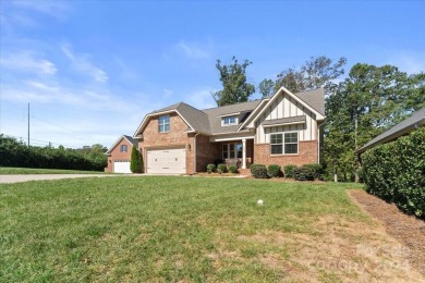 Take a look at this stunning, well maintained all brick home on Cowans Ford Country Club in North Carolina - for sale on GolfHomes.com, golf home, golf lot