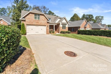 Take a look at this stunning, well maintained all brick home on Cowans Ford Country Club in North Carolina - for sale on GolfHomes.com, golf home, golf lot