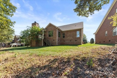 Take a look at this stunning, well maintained all brick home on Cowans Ford Country Club in North Carolina - for sale on GolfHomes.com, golf home, golf lot