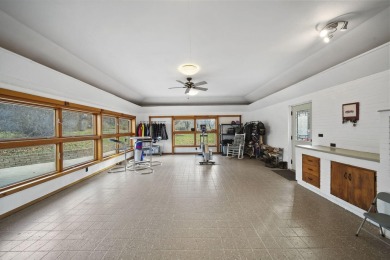 FIVE BEDROOM, expansive first floor home on ALMOST 5.0 acres in on Hickory Hills Golf Club in Michigan - for sale on GolfHomes.com, golf home, golf lot