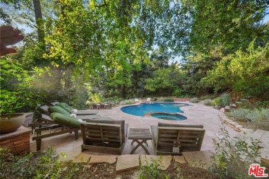 Nestled in the heart of Woodland Hills, this exceptional on Woodland Hills Country Club in California - for sale on GolfHomes.com, golf home, golf lot