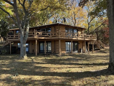 This one-of-a-kind waterfront property invites you to experience on Lake Carroll Golf Course in Illinois - for sale on GolfHomes.com, golf home, golf lot