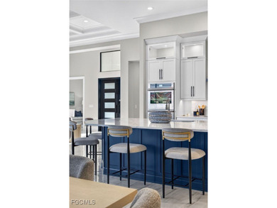 Introducing the Marsala Family Room Model - a stunning new on Royal Tee Country Club in Florida - for sale on GolfHomes.com, golf home, golf lot