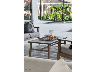 Introducing the Marsala Family Room Model - a stunning new on Royal Tee Country Club in Florida - for sale on GolfHomes.com, golf home, golf lot