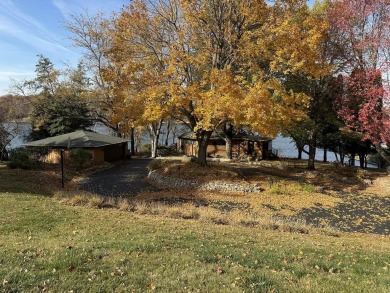 This one-of-a-kind waterfront property invites you to experience on Lake Carroll Golf Course in Illinois - for sale on GolfHomes.com, golf home, golf lot