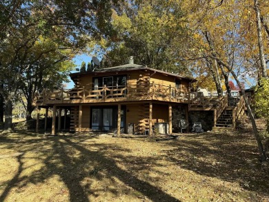 This one-of-a-kind waterfront property invites you to experience on Lake Carroll Golf Course in Illinois - for sale on GolfHomes.com, golf home, golf lot