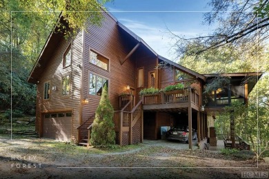 Nestled on a sprawling private lot, this enchanting on Sapphire National Golf Club in North Carolina - for sale on GolfHomes.com, golf home, golf lot