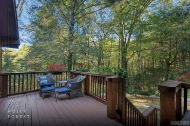 Nestled on a sprawling private lot, this enchanting on Sapphire National Golf Club in North Carolina - for sale on GolfHomes.com, golf home, golf lot