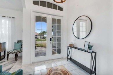 Welcome to 1720 SW 49th Ln, a charming 3-bedroom, 2-bathroom on Royal Tee Country Club in Florida - for sale on GolfHomes.com, golf home, golf lot