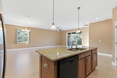 BRAND NEW ROOF, BRAND NEW A/C, BRAND NEW REFRIGERATOR! GATED on Heritage Isles Golf and Country Club in Florida - for sale on GolfHomes.com, golf home, golf lot