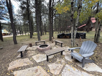 Beautiful getaway in Angel Fire only 1,7 mi from the ski basin & on Angel Fire Resort Country Club in New Mexico - for sale on GolfHomes.com, golf home, golf lot