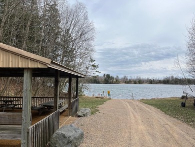 A buildable lot with deeded access to Big Twin Lake, only a few on Maplewood Golf Course in Wisconsin - for sale on GolfHomes.com, golf home, golf lot