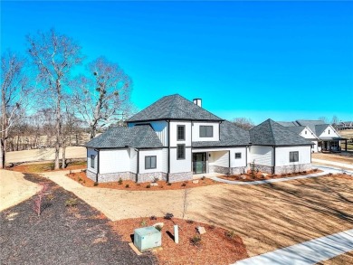 Beautiful new construction home located in the prestigious Sandy on Double Oaks Golf Club in Georgia - for sale on GolfHomes.com, golf home, golf lot