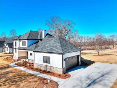 Beautiful new construction home located in the prestigious Sandy on Double Oaks Golf Club in Georgia - for sale on GolfHomes.com, golf home, golf lot