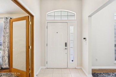 Welcome to this charming and cozy 4-bedroom, 3-bath home located on Julington Creek Golf Club in Florida - for sale on GolfHomes.com, golf home, golf lot