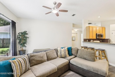 Welcome to this charming and cozy 4-bedroom, 3-bath home located on Julington Creek Golf Club in Florida - for sale on GolfHomes.com, golf home, golf lot