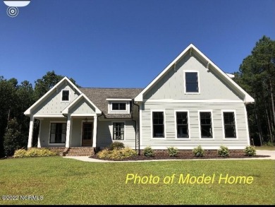 NEW CONSTRUCTION 4 bedroom, 4-1/2 bath home offered in the on Carolina National Golf Club in North Carolina - for sale on GolfHomes.com, golf home, golf lot