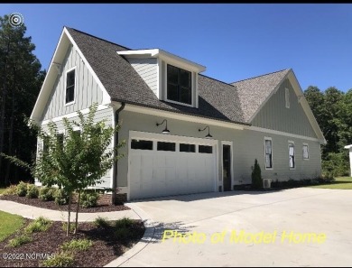 NEW CONSTRUCTION 4 bedroom, 4-1/2 bath home offered in the on Carolina National Golf Club in North Carolina - for sale on GolfHomes.com, golf home, golf lot