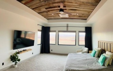 This exquisite estate, perfectly perched to offer panoramic on Lake Powell National Golf Course in Arizona - for sale on GolfHomes.com, golf home, golf lot