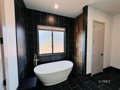 This exquisite estate, perfectly perched to offer panoramic on Lake Powell National Golf Course in Arizona - for sale on GolfHomes.com, golf home, golf lot