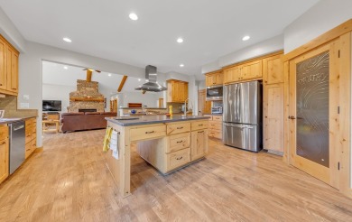 Nestled in the pines on a level two acre lot, this stunning on Lake Almanor West Golf Course in California - for sale on GolfHomes.com, golf home, golf lot