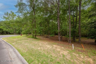 Discover the perfect spot to build your dream home on this on Rivers Edge Golf Club in North Carolina - for sale on GolfHomes.com, golf home, golf lot