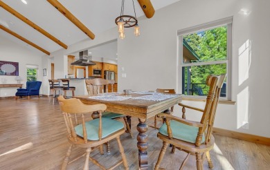 Nestled in the pines on a level two acre lot, this stunning on Lake Almanor West Golf Course in California - for sale on GolfHomes.com, golf home, golf lot