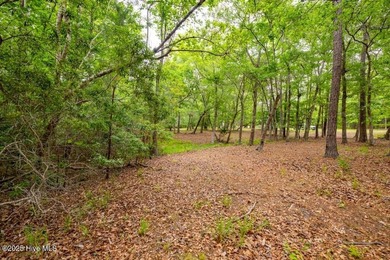 Discover the perfect spot to build your dream home on this on Rivers Edge Golf Club in North Carolina - for sale on GolfHomes.com, golf home, golf lot