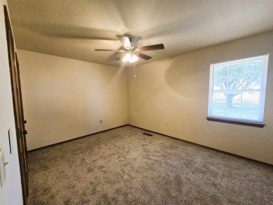 Welcome to this inviting 3-bedroom, 2-bathroom home offering on Pheasant Run in Oklahoma - for sale on GolfHomes.com, golf home, golf lot