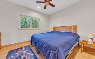 Nestled in the pines on a level two acre lot, this stunning on Lake Almanor West Golf Course in California - for sale on GolfHomes.com, golf home, golf lot