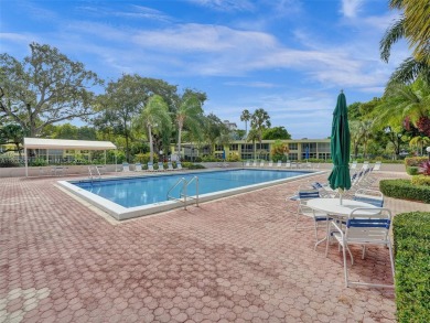 Welcome to Palm-Aire Country Club's luxurious lifestyle. This on Palm-Aire Country Club and Resort - The Oaks in Florida - for sale on GolfHomes.com, golf home, golf lot