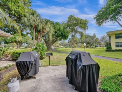Welcome to Palm-Aire Country Club's luxurious lifestyle. This on Palm-Aire Country Club and Resort - The Oaks in Florida - for sale on GolfHomes.com, golf home, golf lot