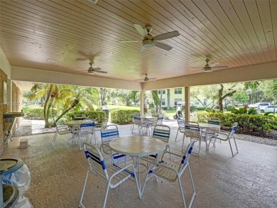 Welcome to Palm-Aire Country Club's luxurious lifestyle. This on Palm-Aire Country Club and Resort - The Oaks in Florida - for sale on GolfHomes.com, golf home, golf lot
