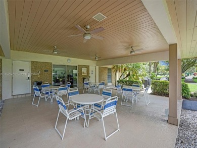 Welcome to Palm-Aire Country Club's luxurious lifestyle. This on Palm-Aire Country Club and Resort - The Oaks in Florida - for sale on GolfHomes.com, golf home, golf lot