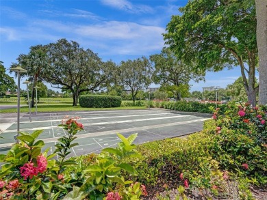 Welcome to Palm-Aire Country Club's luxurious lifestyle. This on Palm-Aire Country Club and Resort - The Oaks in Florida - for sale on GolfHomes.com, golf home, golf lot