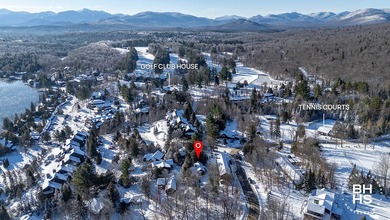 The idyllic and quintessential Adirondack Cottage that everyone on Whiteface Club and Resort in New York - for sale on GolfHomes.com, golf home, golf lot