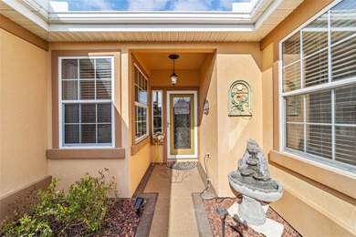 WOW is what you'll say as you step inside this custom Coral on Eagle Ridge At Spruce Creek Country Club in Florida - for sale on GolfHomes.com, golf home, golf lot