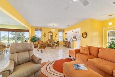 WOW is what you'll say as you step inside this custom Coral on Eagle Ridge At Spruce Creek Country Club in Florida - for sale on GolfHomes.com, golf home, golf lot