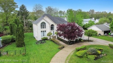 Gorgeous Spacious Contemporary 5 Bedroom Home Situated in a on Knollwood Country Club in Michigan - for sale on GolfHomes.com, golf home, golf lot