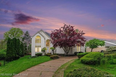 Gorgeous Spacious Contemporary 5 Bedroom Home Situated in a on Knollwood Country Club in Michigan - for sale on GolfHomes.com, golf home, golf lot