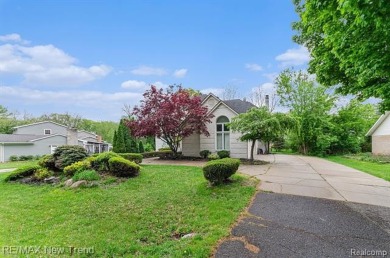Gorgeous Spacious Contemporary 5 Bedroom Home Situated in a on Knollwood Country Club in Michigan - for sale on GolfHomes.com, golf home, golf lot