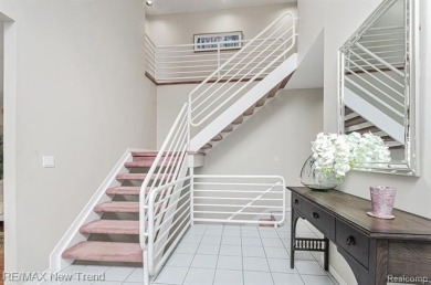 Gorgeous Spacious Contemporary 5 Bedroom Home Situated in a on Knollwood Country Club in Michigan - for sale on GolfHomes.com, golf home, golf lot