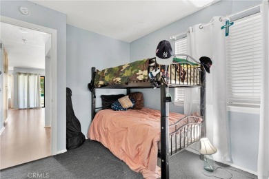Welcome to this delightful two-bedroom, one-bath condominium on Silver Lakes Golf Course in California - for sale on GolfHomes.com, golf home, golf lot