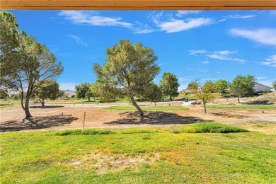 Welcome to this delightful two-bedroom, one-bath condominium on Silver Lakes Golf Course in California - for sale on GolfHomes.com, golf home, golf lot