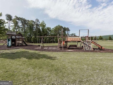 **BEST DEAL IN TOWN!!** Nestled in a serene lake community, this on The Highlands Course at Lake Arrowhead in Georgia - for sale on GolfHomes.com, golf home, golf lot
