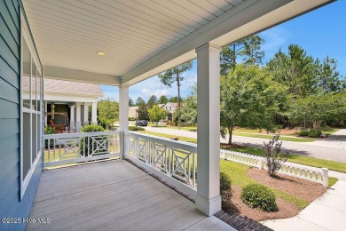 This beautiful and well-maintained coastal home is within on Cape Fear National At Brunswick Forest in North Carolina - for sale on GolfHomes.com, golf home, golf lot