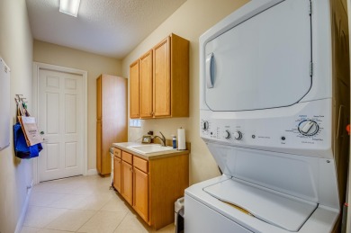 Great Preserve home with open floor plan and pool over golf on Ibis Golf and Country Club in Florida - for sale on GolfHomes.com, golf home, golf lot