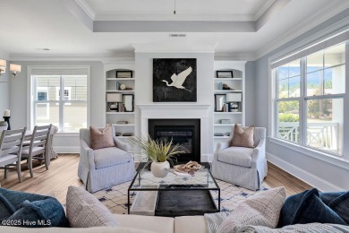 This beautiful and well-maintained coastal home is within on Cape Fear National At Brunswick Forest in North Carolina - for sale on GolfHomes.com, golf home, golf lot
