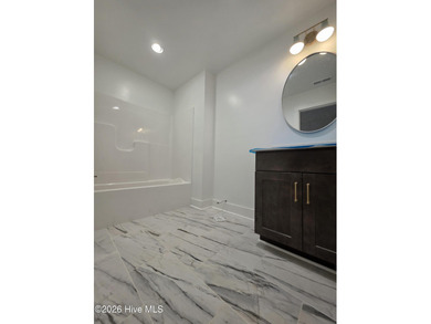 Discover refined living in this stunning new construction by on Seven Lakes Country Club in North Carolina - for sale on GolfHomes.com, golf home, golf lot