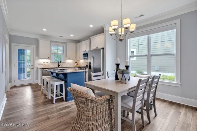 This beautiful and well-maintained coastal home is within on Cape Fear National At Brunswick Forest in North Carolina - for sale on GolfHomes.com, golf home, golf lot